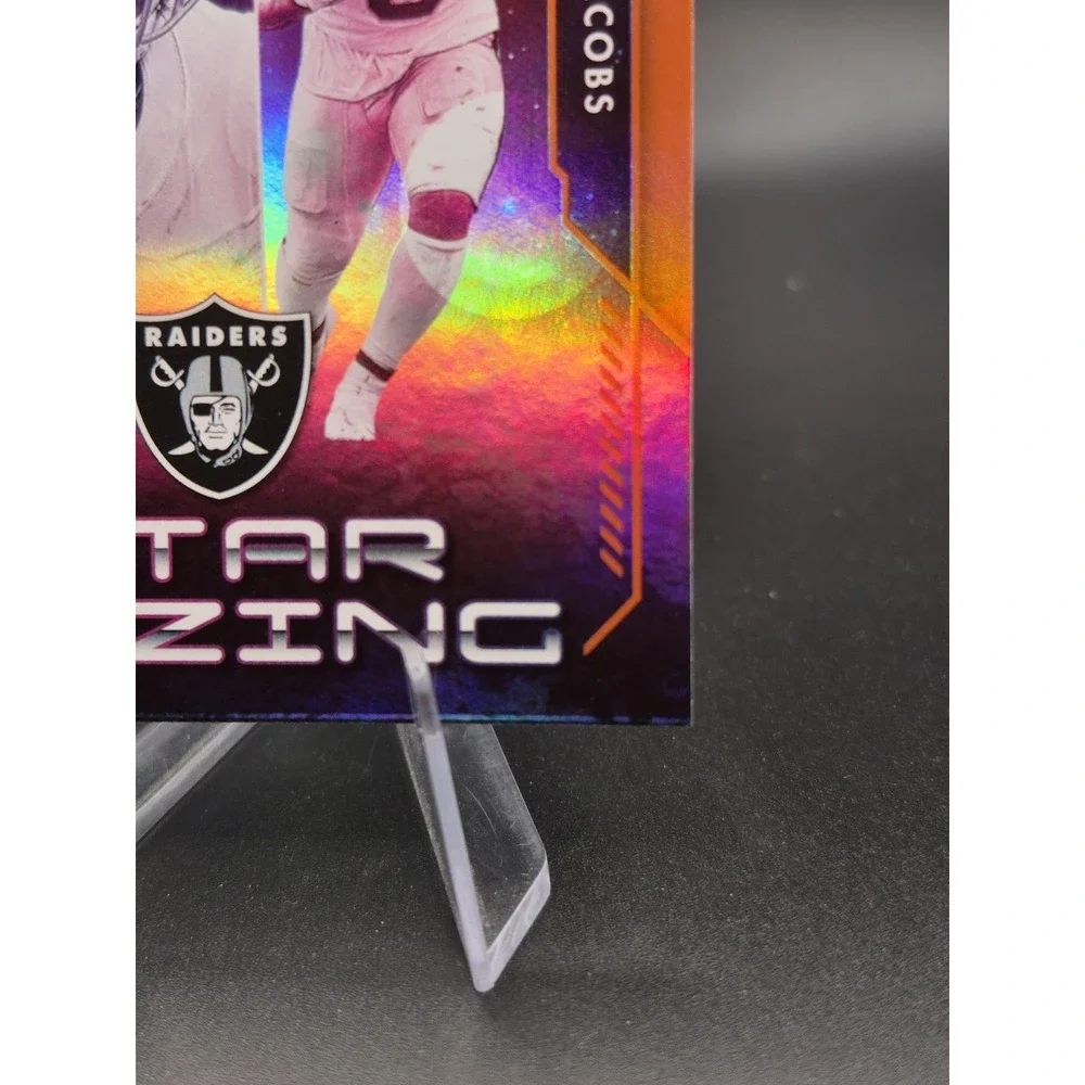 2023 Panini Absolute Josh Jacobs #SG-11 Star Gazing Orange /75 Packers Raiders
